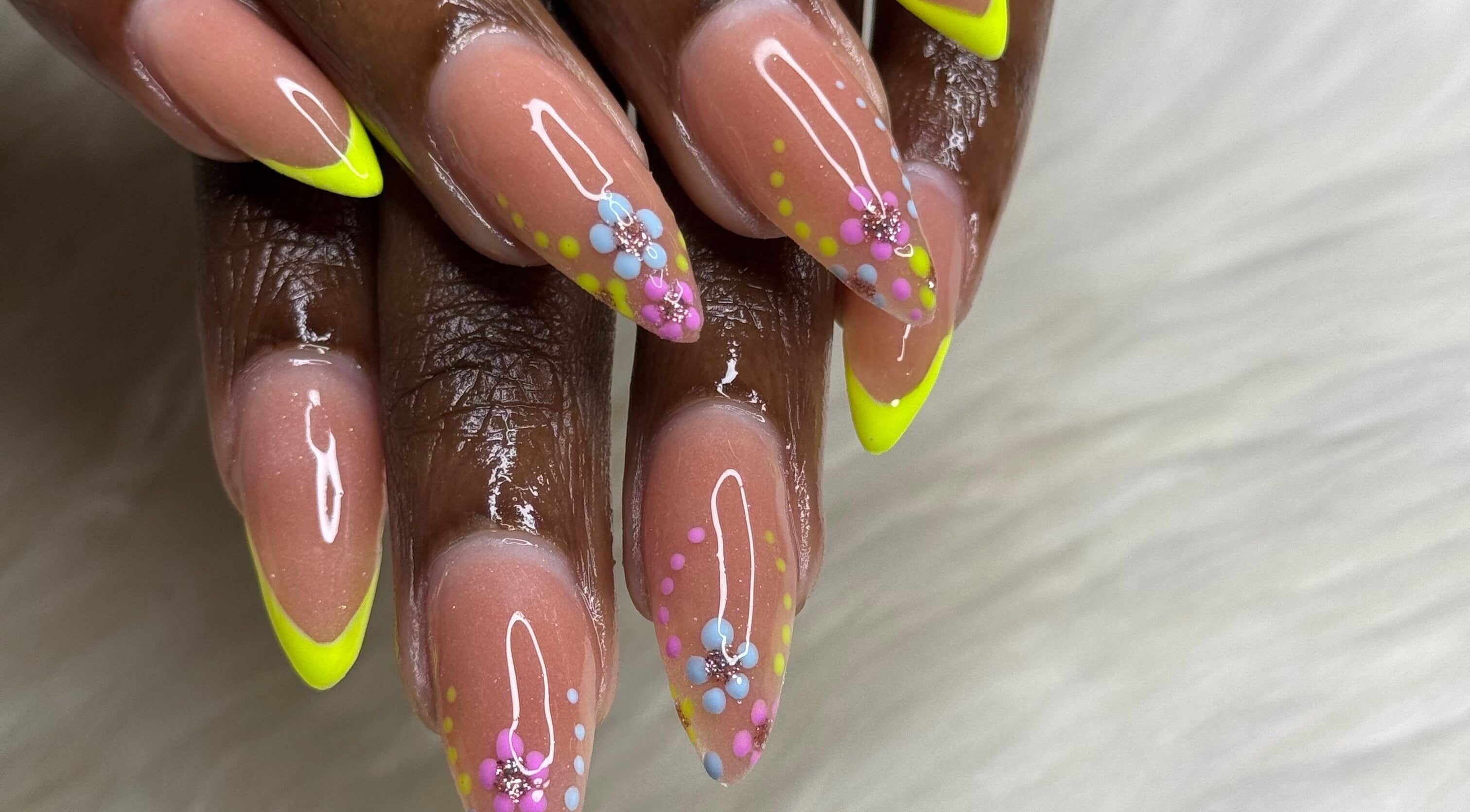 Colorful nail art with floral accents at The Beauty Lab by Rìa-Ashlée, Saint James, Saint James, BB.