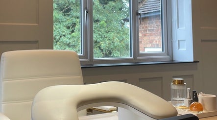 Relaxing nail salon setting at Nail by Lils, Tamworth, England, GB with a manicure chair and window view.