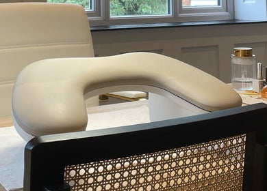 Cozy nail station setup at Nail by Lils, Tamworth, England, GB, featuring comfortable seating and nail care products.