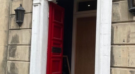 Charming red door entrance at Nail by Lils, Tamworth, England, GB.