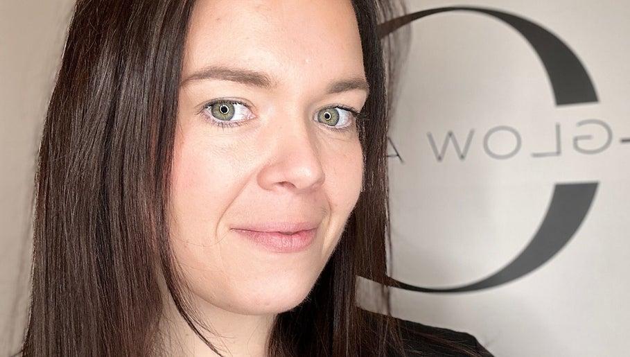 Professional at Glow Aesthetics by Chloe, Northampton, England, GB, smiling confidently at the camera.