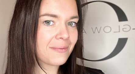 Professional at Glow Aesthetics by Chloe, Northampton, England, GB, smiling confidently at the camera.