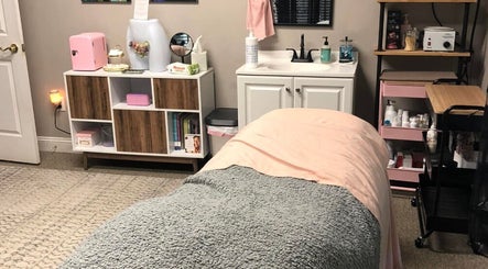 Elegant treatment room at Pb Beauty Bar, Mooresville, North Carolina, US, featuring cozy decor and calming ambiance.
