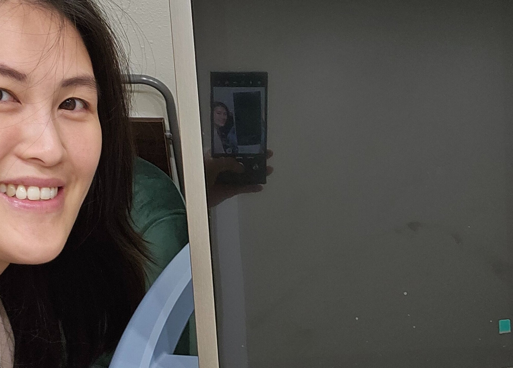 Smiling person beside equipment at Full Circle Aesthetics in Spokane Valley, Washington, US.