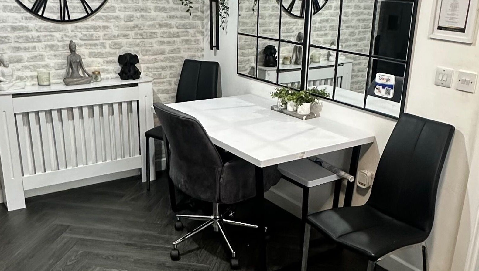 Modern waiting area at Hair To Dye For, Luton, England, GB with chic decor and comfortable seating.