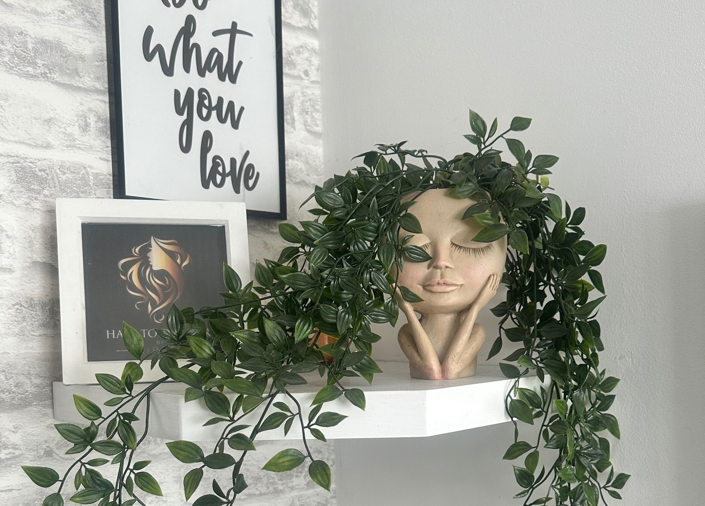 Decorative planter with vines at Hair To Dye For, Luton, England, GB.