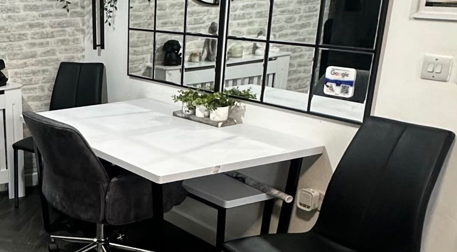 Modern waiting area with sleek chairs at Hair To Dye For in Luton, England, GB.