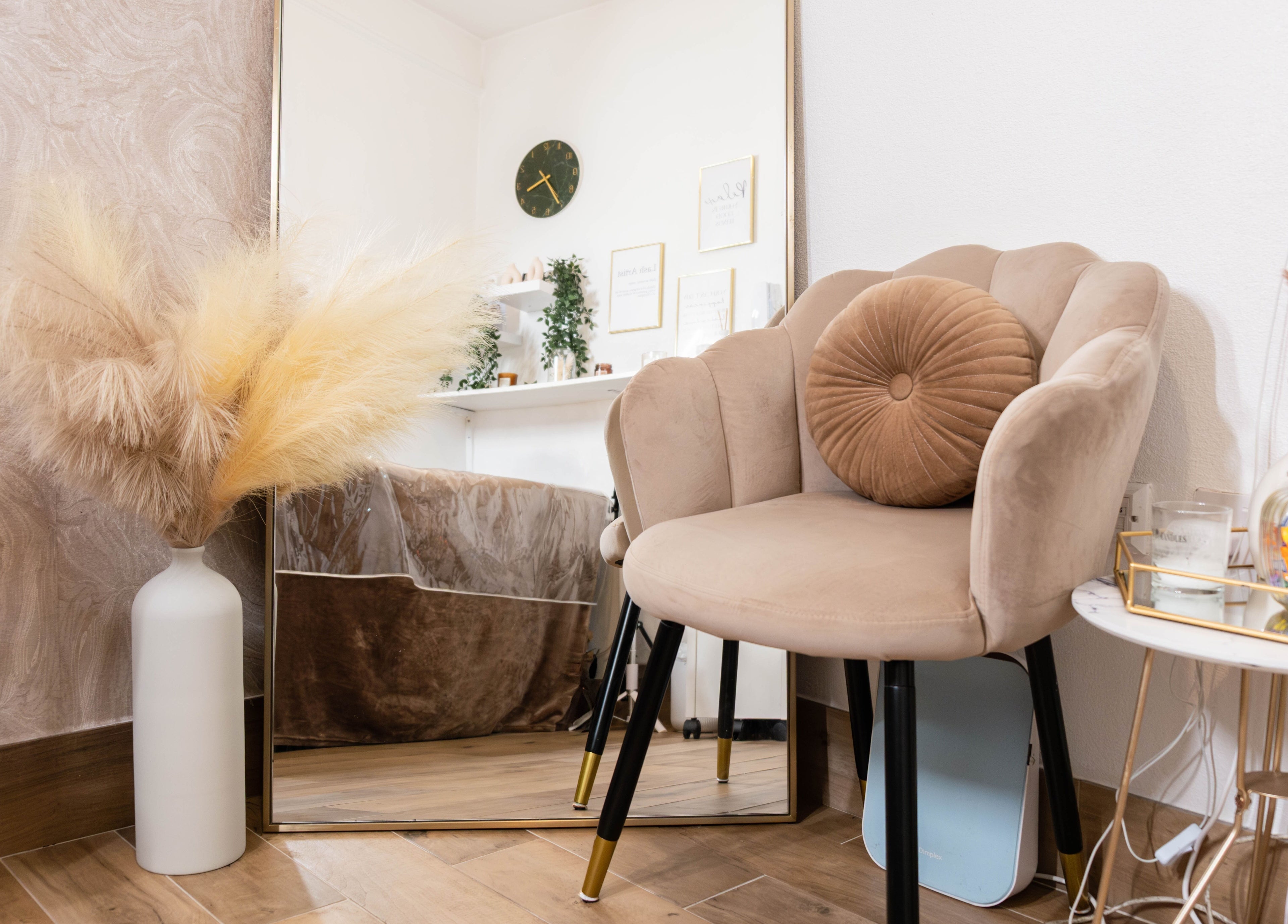 Elegant seating area at Arieyes, London, England, GB featuring plush chair and decorative accents.