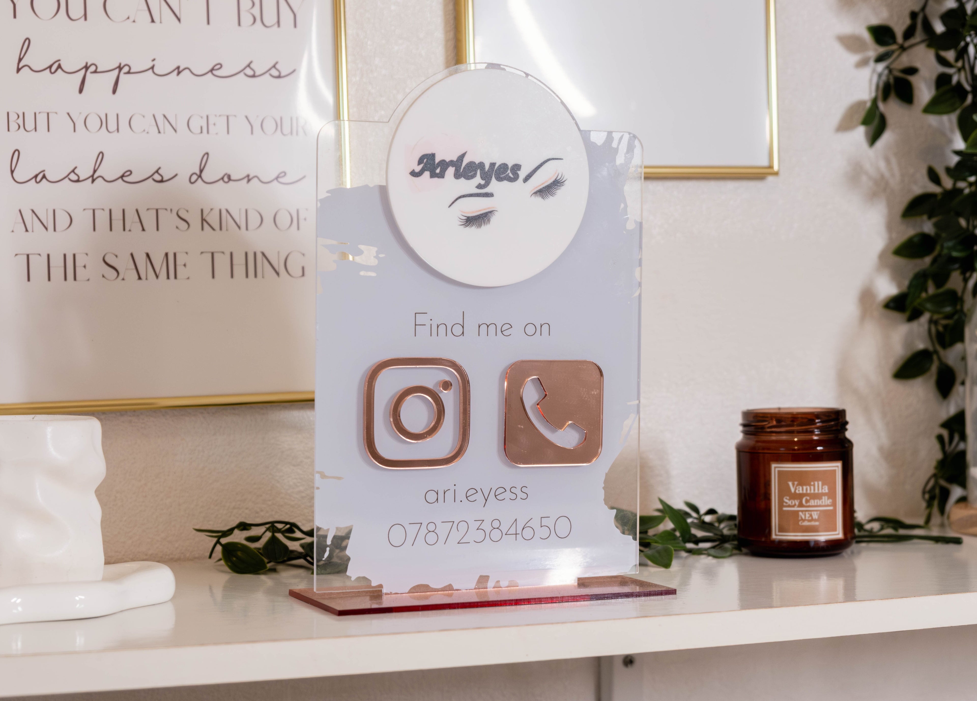 Stylish display at Arieyes, London, England, GB with decor and contact info.