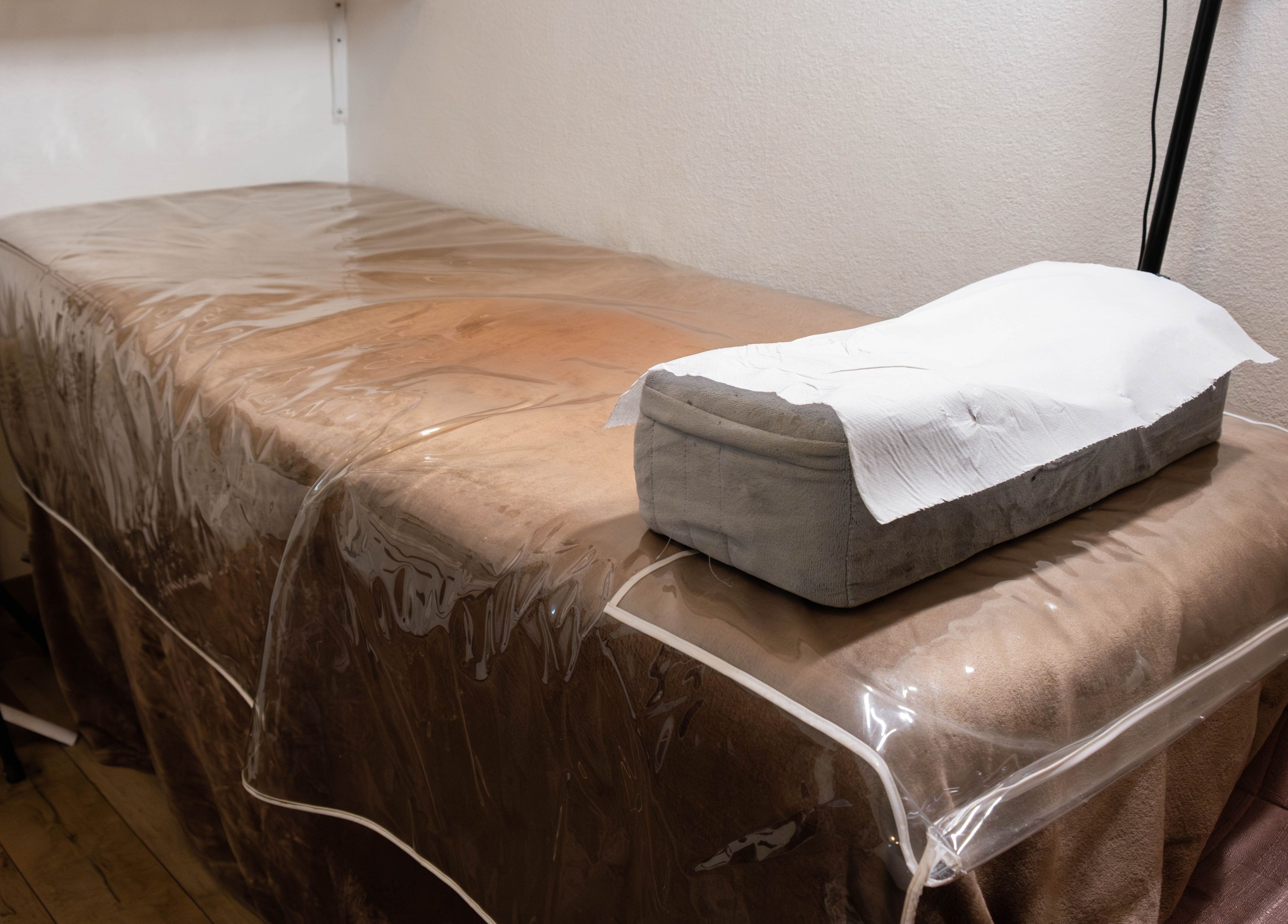 Serene therapy bed setup at Arieyes, London, England, GB for wellness treatments.