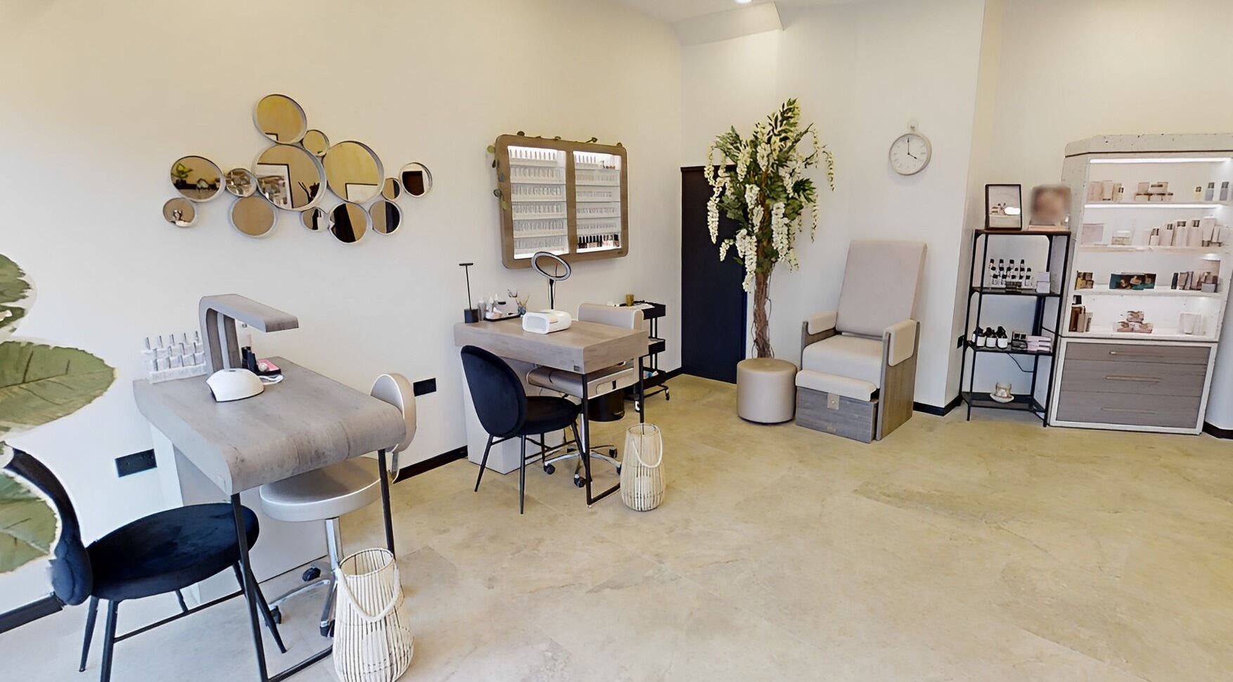 Chic interior of Calon Beauty in Cardiff, Wales, GB with modern decor and beauty products display.