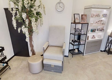 Luxurious spa chair at Calon Beauty, Cardiff, Wales, GB showcasing serene and inviting wellness space.