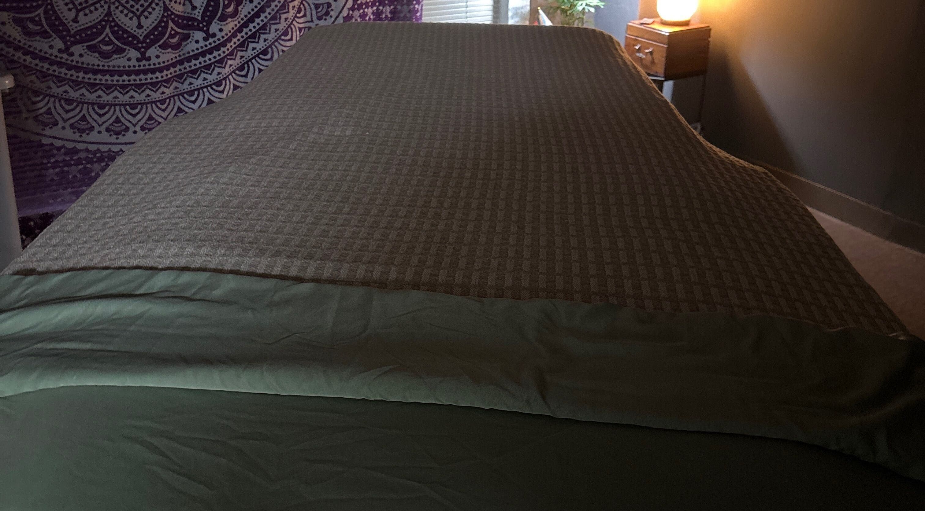 Cozy massage room at Coastal Relaxation, Tulsa, Oklahoma, US with soft lighting and warm decor.