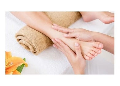 Foot massage at Valentina Holistic Therapy, Kirkcaldy, Scotland, GB, promoting relaxation and wellness.