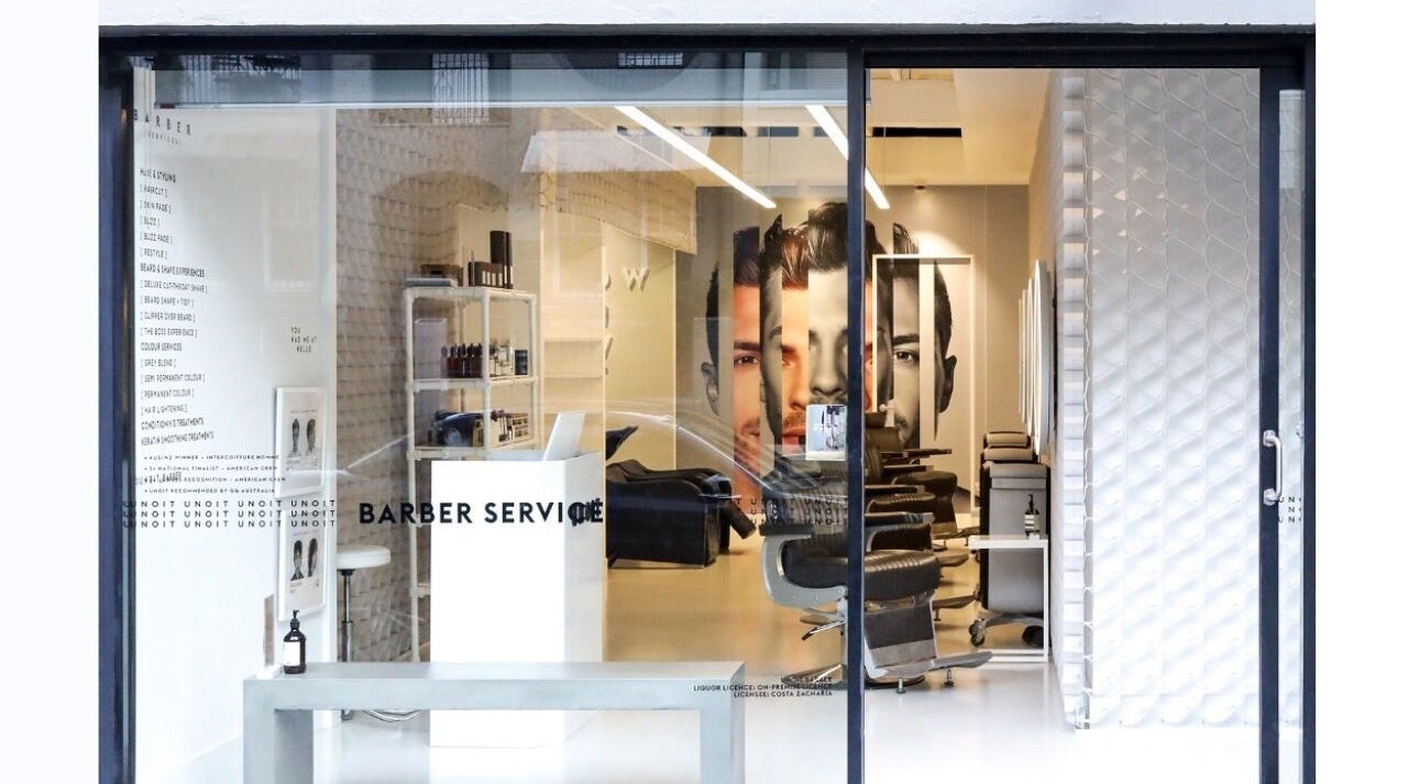 Interior view of UNOIT Barber in Darlinghurst, New South Wales, AU showcasing sleek, modern design.