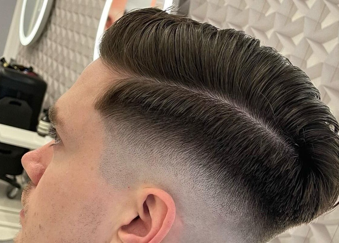 Close-up of a sleek fade haircut at UNOIT Barber, Darlinghurst, New South Wales, AU.