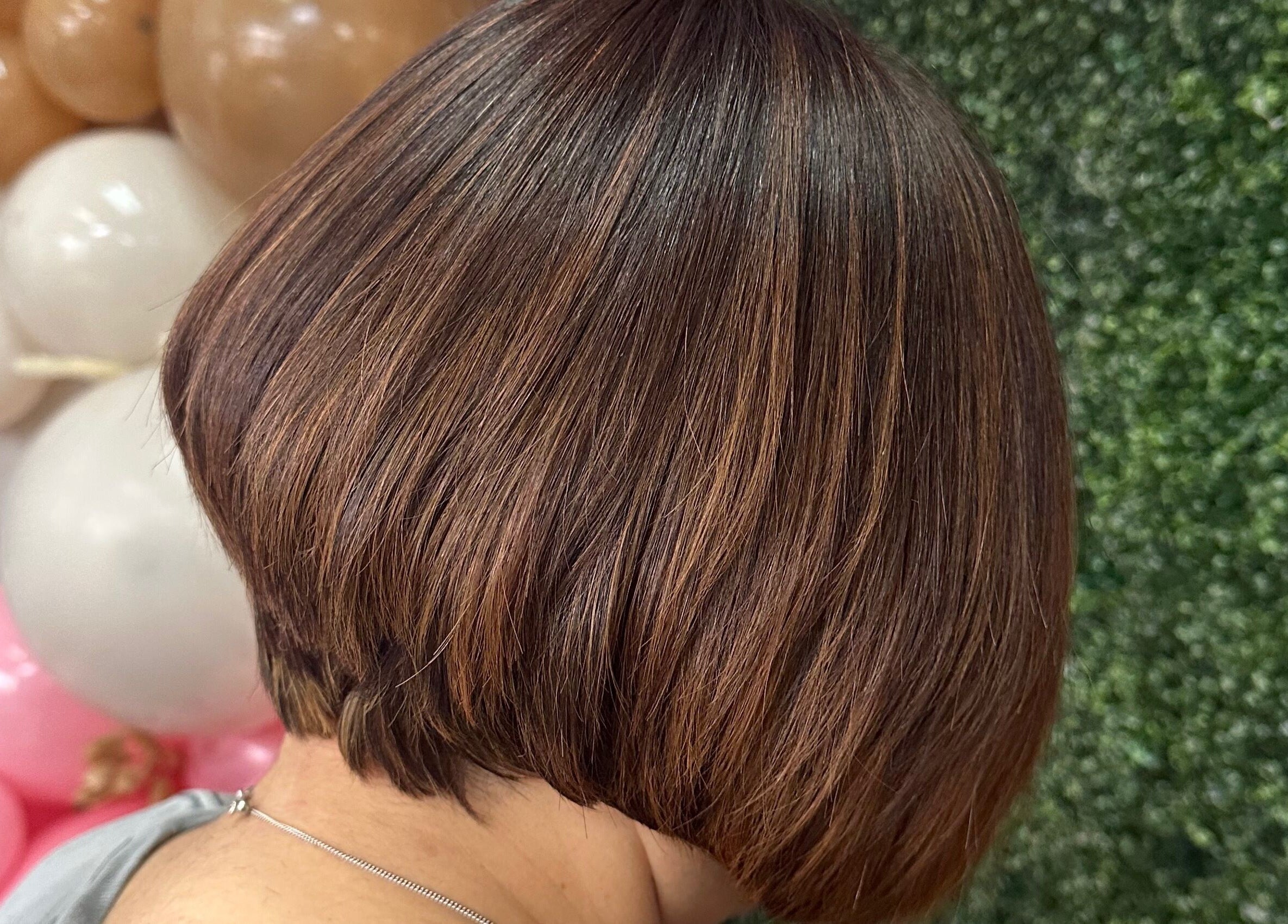 Sleek bob haircut showcased at Concept Dominican Hair Studio in West Palm Beach, Florida, US.