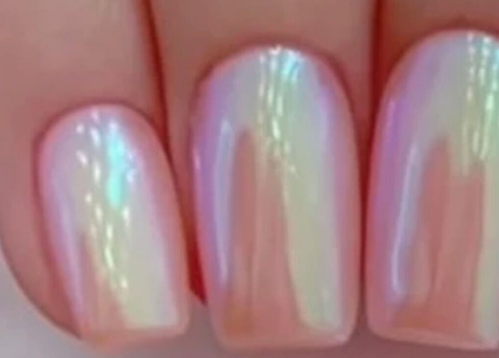 Close-up of iridescent nail art at Concept Dominican Hair Studio, West Palm Beach, Florida, US.