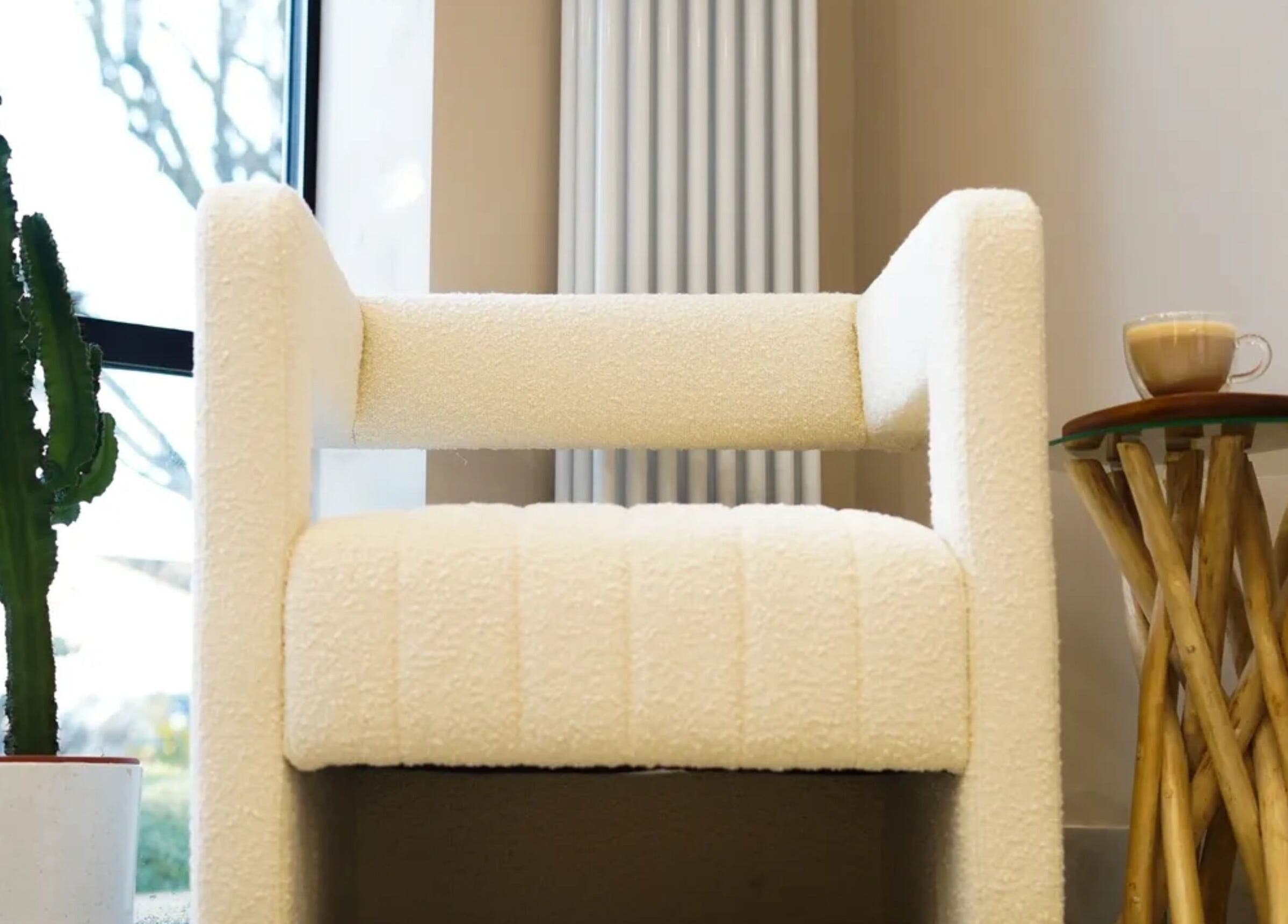 Relaxing seating area with a cactus at Grace Waker Hair, Oakley, England, GB.