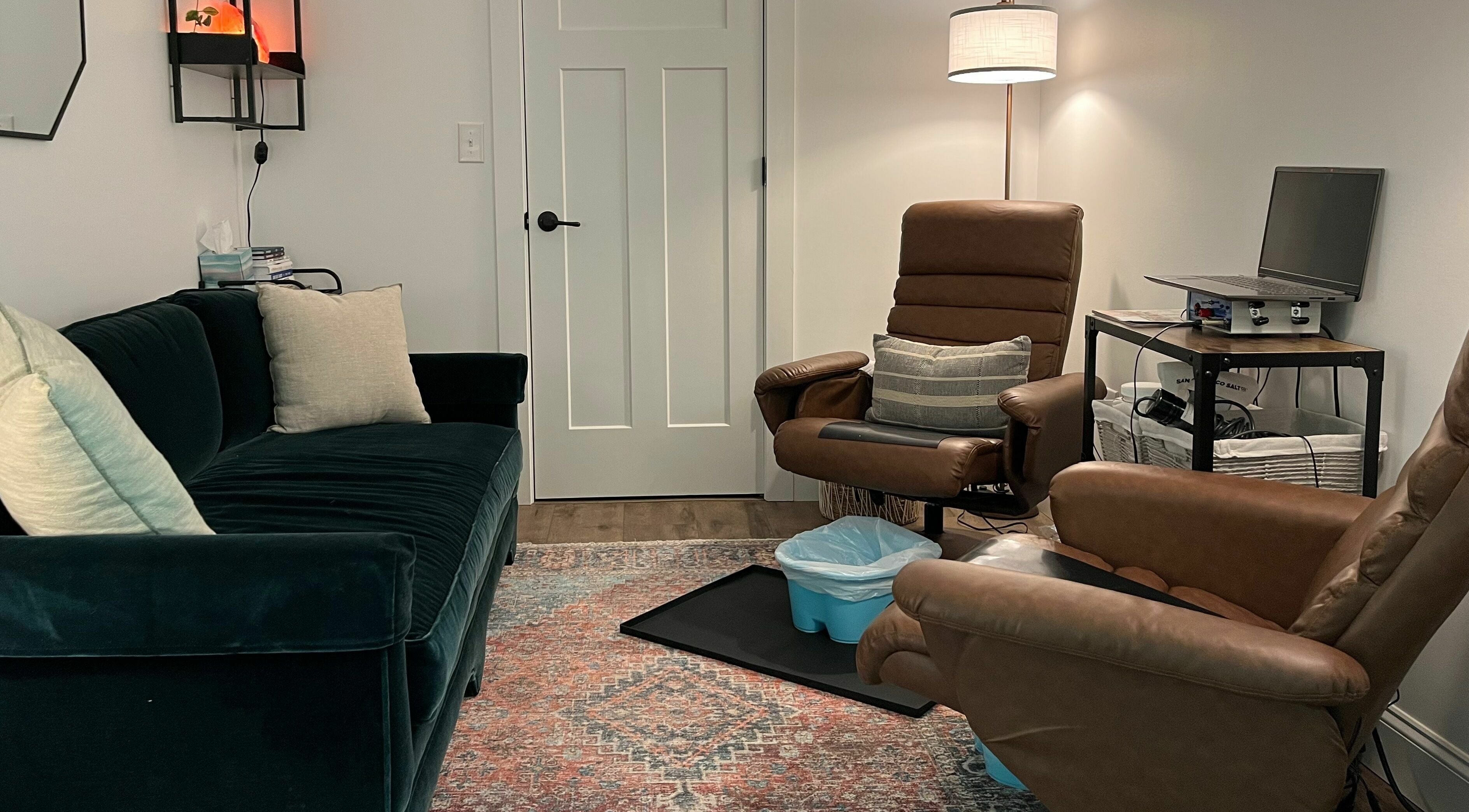 Modern cozy lounge at Eternal Wellness, Inman, United States, US with plush seating and warm lighting.