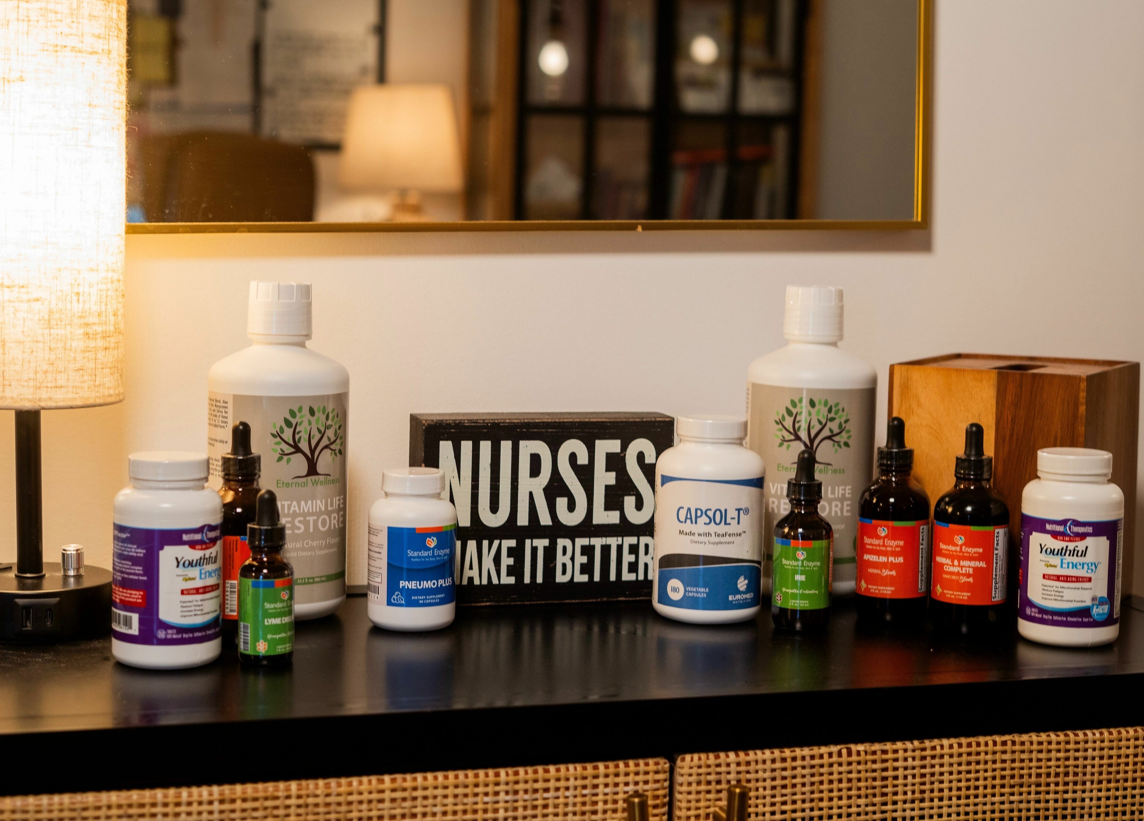 Nutritional supplements lined up at Eternal Wellness, Inman, US, enhancing holistic healing atmosphere.
