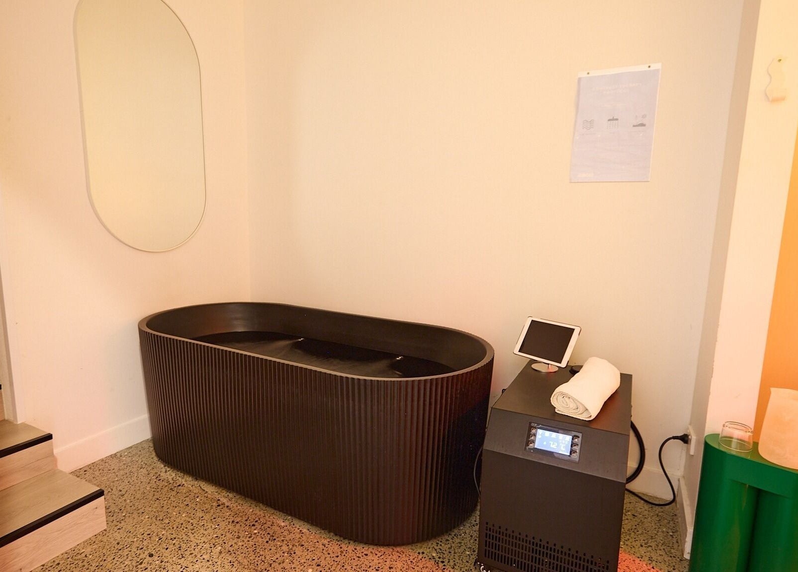 Luxurious spa room with a black bath at Nimbus Co Manly, Manly, New South Wales, AU, offering relaxation and wellness.