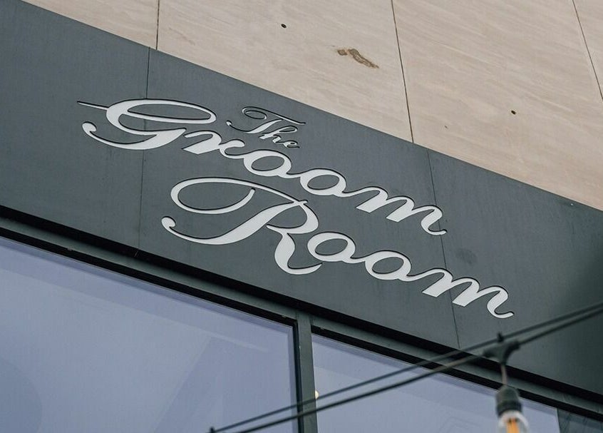 Elegant sign of The Groom Room - Riffa Views located at Al Mazrowiah, BH