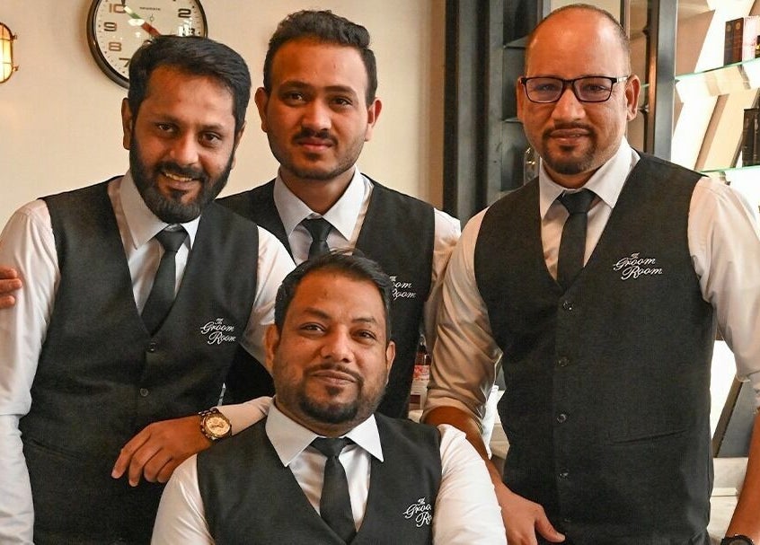 Friendly team at The Groom Room - Riffa Views, Al Mazrowiah, BH, ready to serve with a smile.