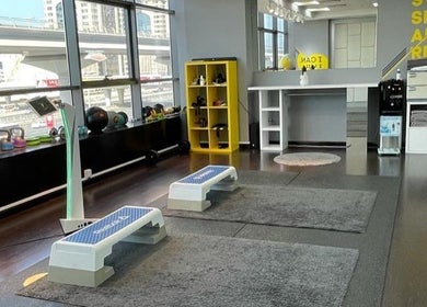Modern fitness studio at Justfit EMS Dubai, showcasing equipment and decor in Dubai, AE.