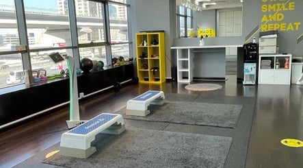 Modern fitness studio at Justfit EMS Dubai, showcasing equipment and decor in Dubai, AE.