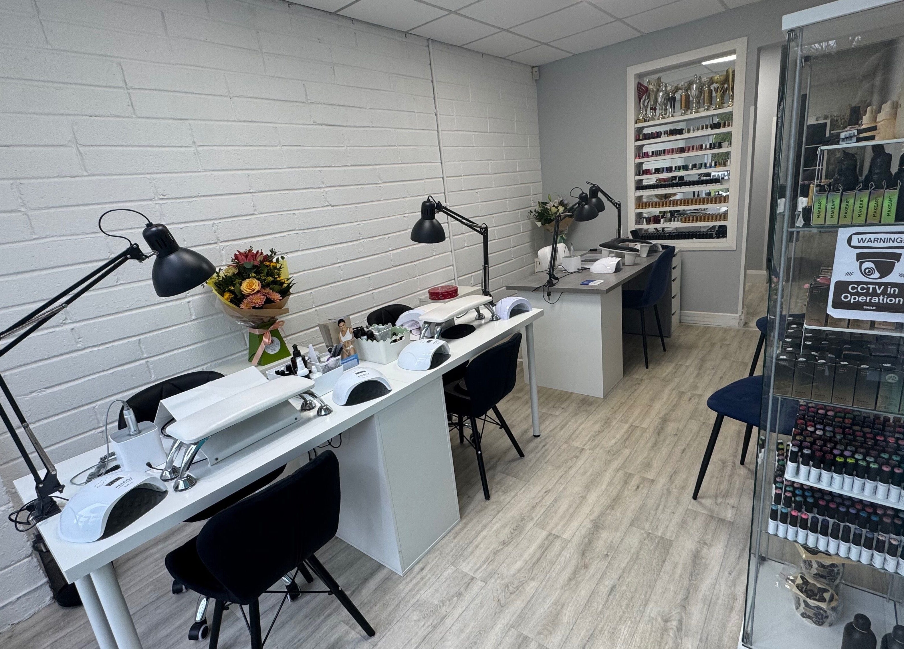 Modern LS Nails and Training studio in Carrigtwohill, County Cork, IE showcasing sleek, elegant nail stations.