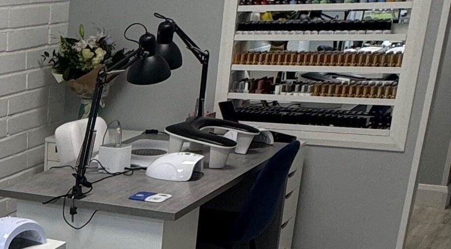 Nail station at LS Nails and Training, Carrigtowhill, County Cork, IE, featuring organized nail polishes.