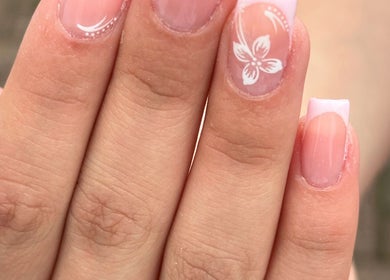 Elegant nail art with floral design by Acenti Skin in London, England, GB.