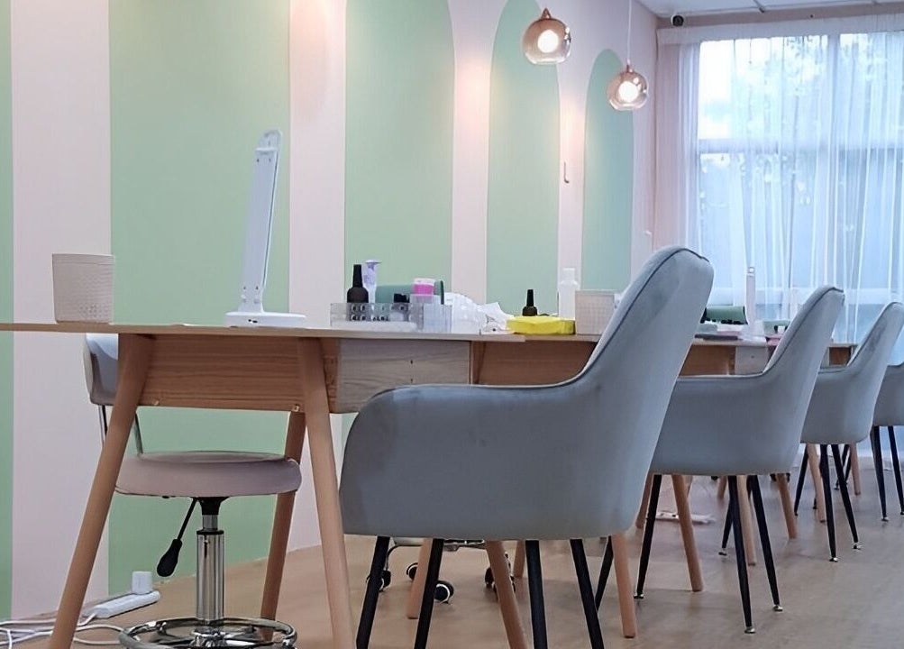 Chic manicure chairs at Manikyu, Cheras, Kuala Lumpur, MY, offering a serene beauty experience.