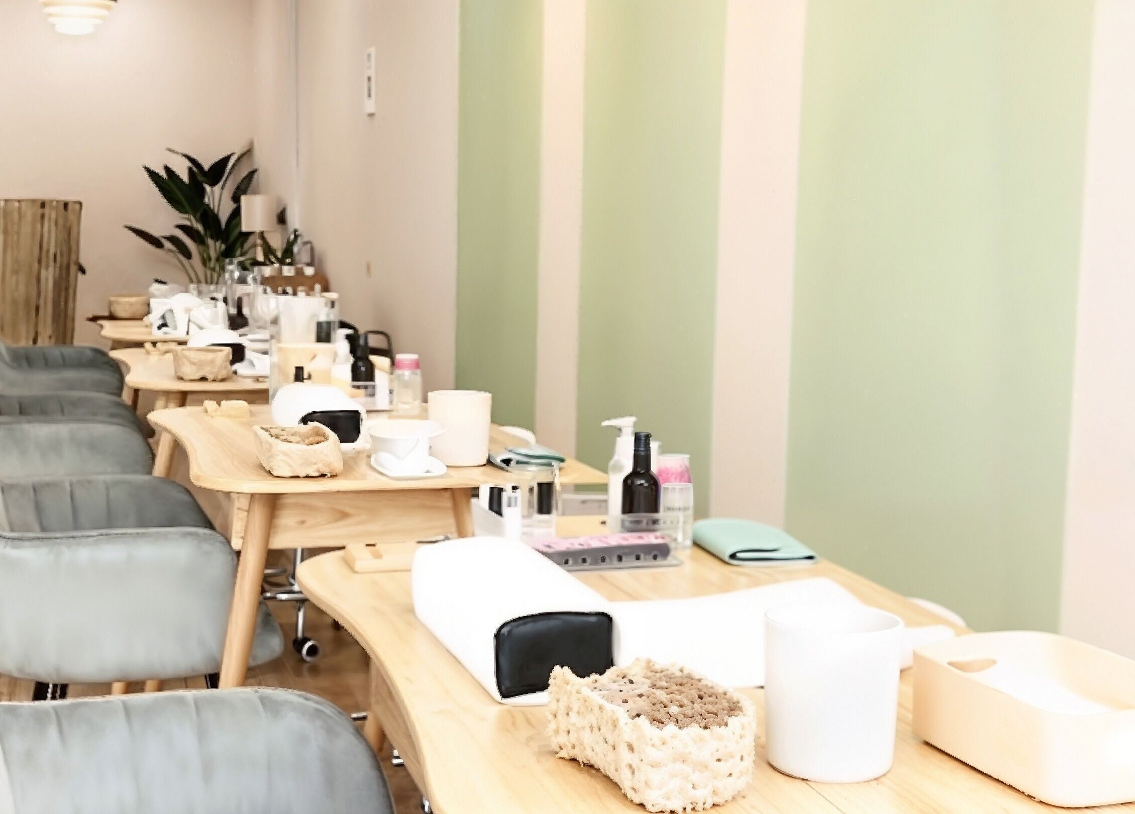 Elegant interior of Manikyu salon with cozy chairs and manicure stations, located in CHERAS, KUALA LUMPUR, MY.