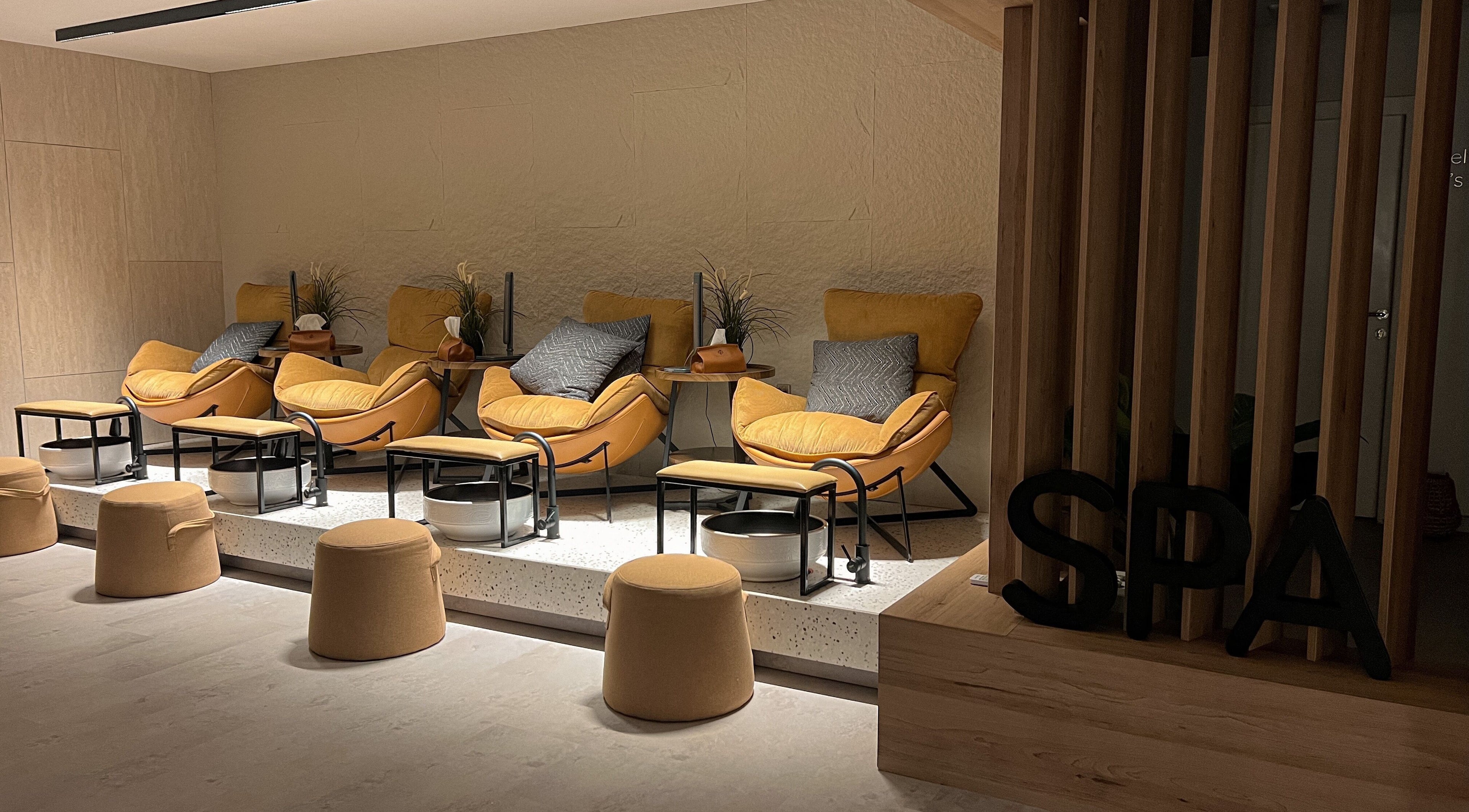 Relaxing seating area at Nail Station SPA, Safwa, Eastern Province, SA offering comfort and tranquility.