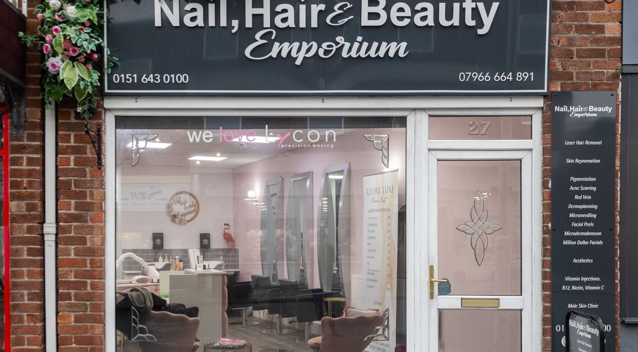Front view of Nail, Hair & Beauty Emporium in Wirral, England, GB featuring elegant signage.