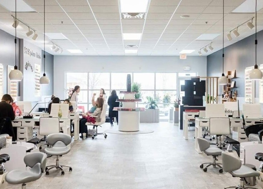 Elysian Nails salon in Neenah, Wisconsin, US, featuring modern interior design and professional manicure stations.