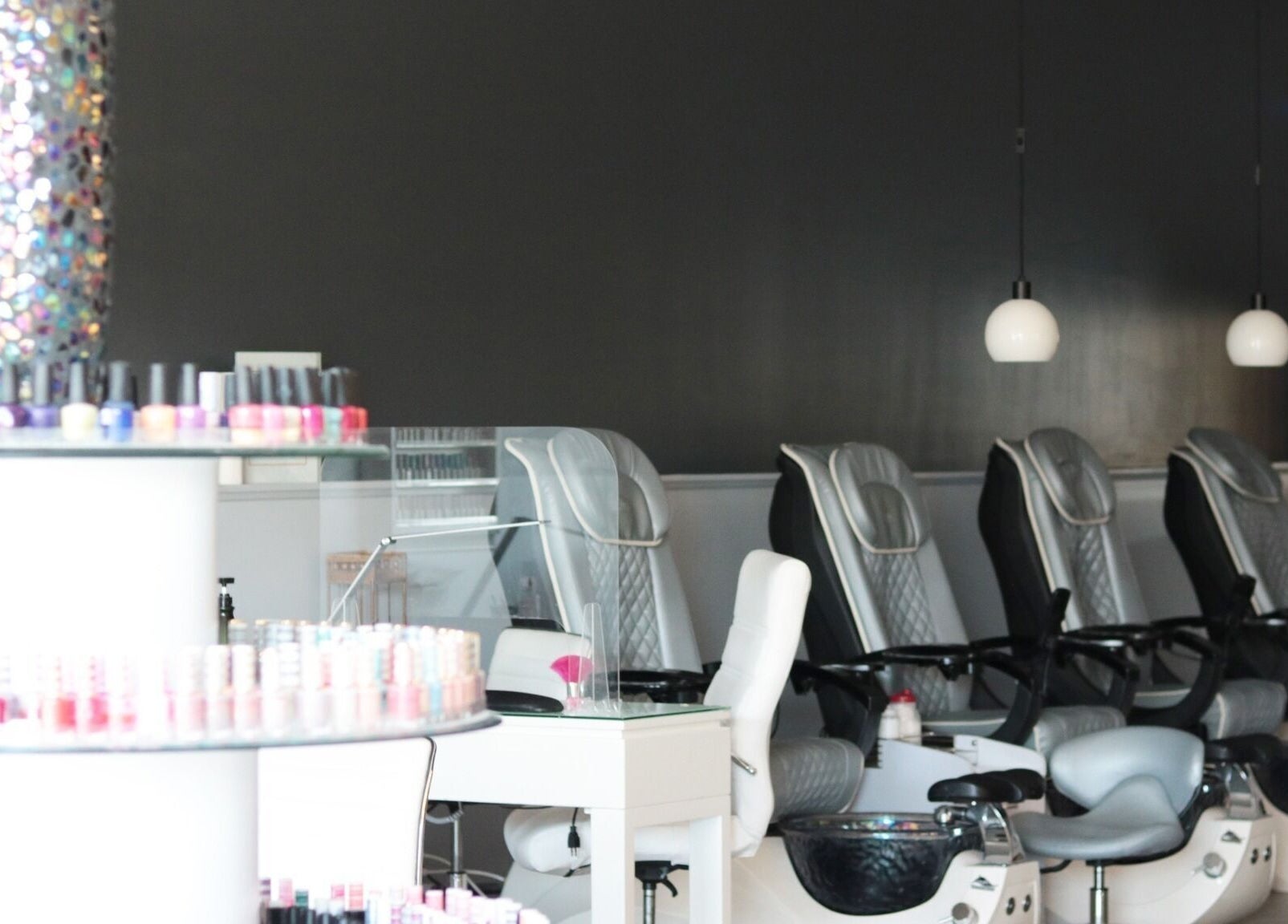 Elysian Nails offers luxurious pedicure chairs in Neenah, Wisconsin, US with a wide array of nail polishes.