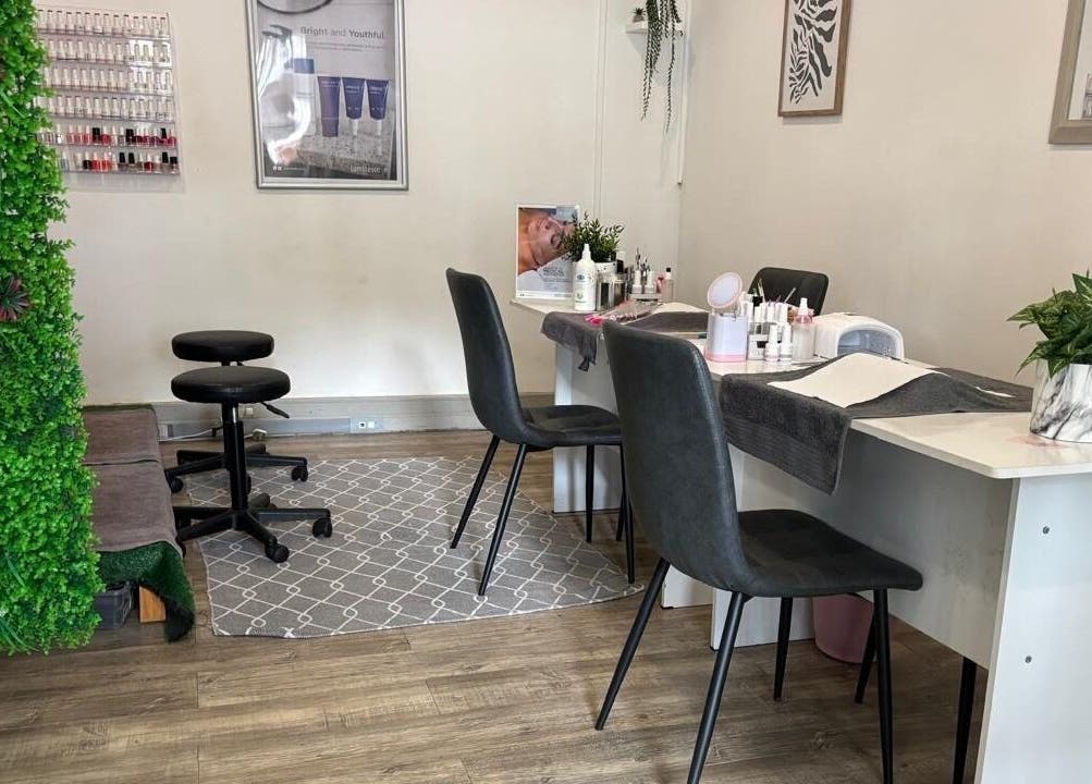 Elegant beauty salon interior at Made up by Mariam, Hillcrest, Kwazulu-natal, ZA showcasing manicure stations.