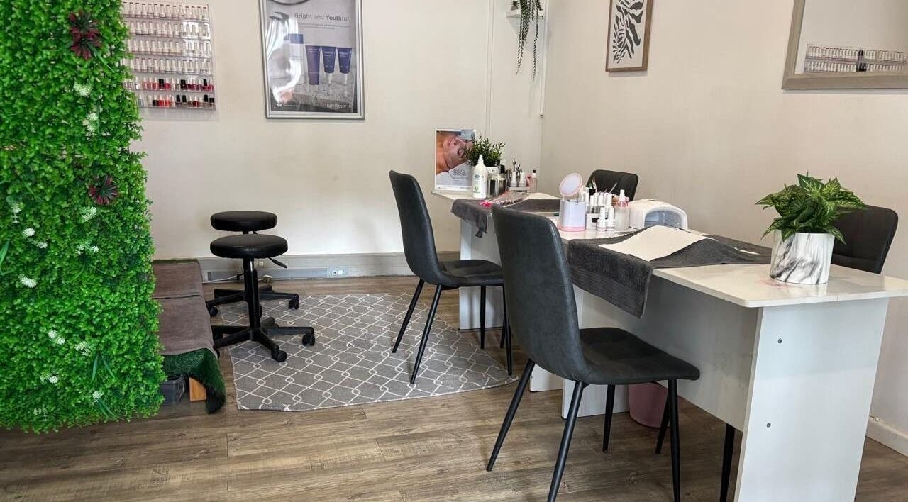 Elegant beauty salon interior at Made up by Mariam, Hillcrest, Kwazulu-natal, ZA showcasing manicure stations.