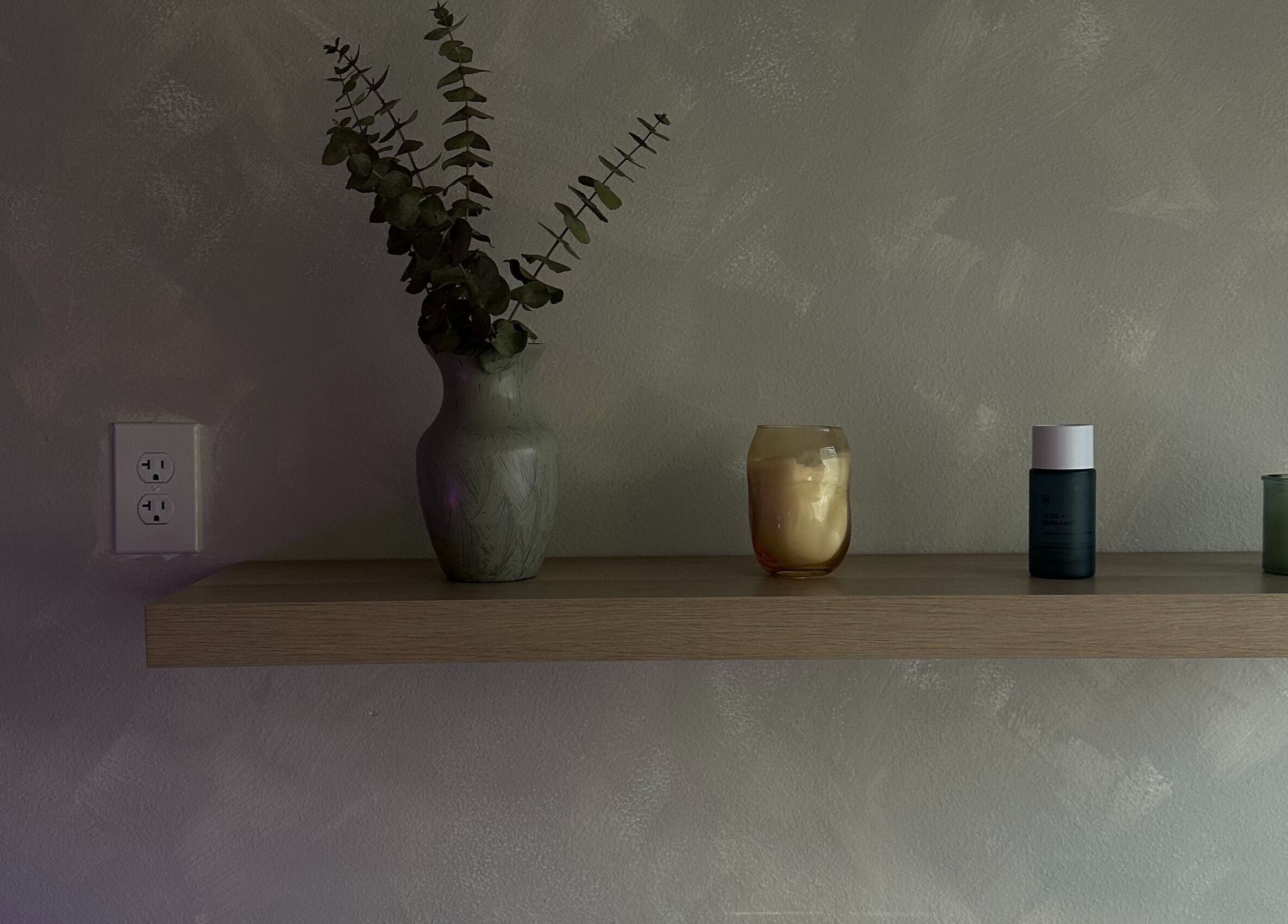 Elegant shelf with decor at EVSSKIN, San Fernando, California, US. Ideal for beauty and wellness ambiance.