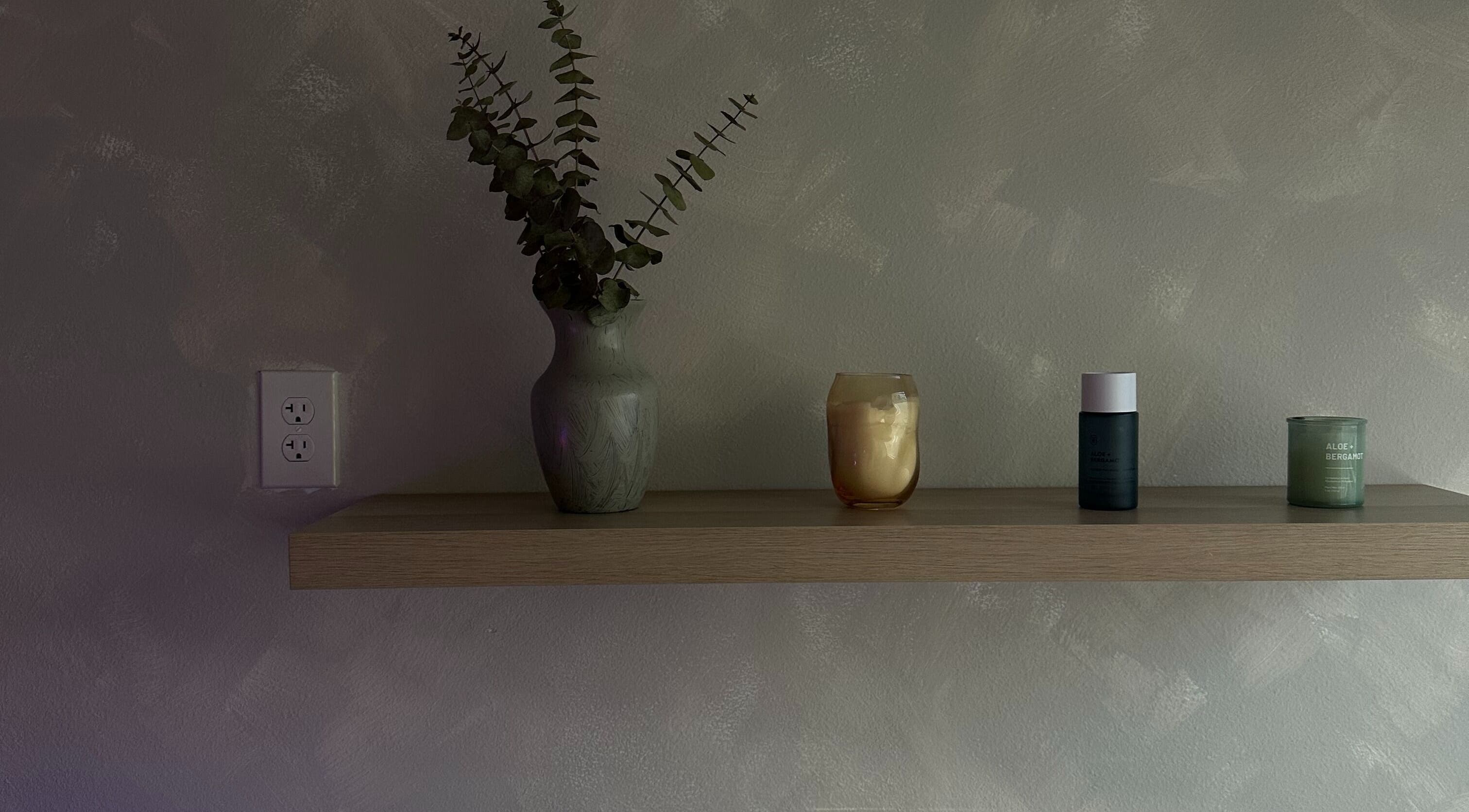 Elegant shelf with decor at EVSSKIN, San Fernando, California, US. Ideal for beauty and wellness ambiance.