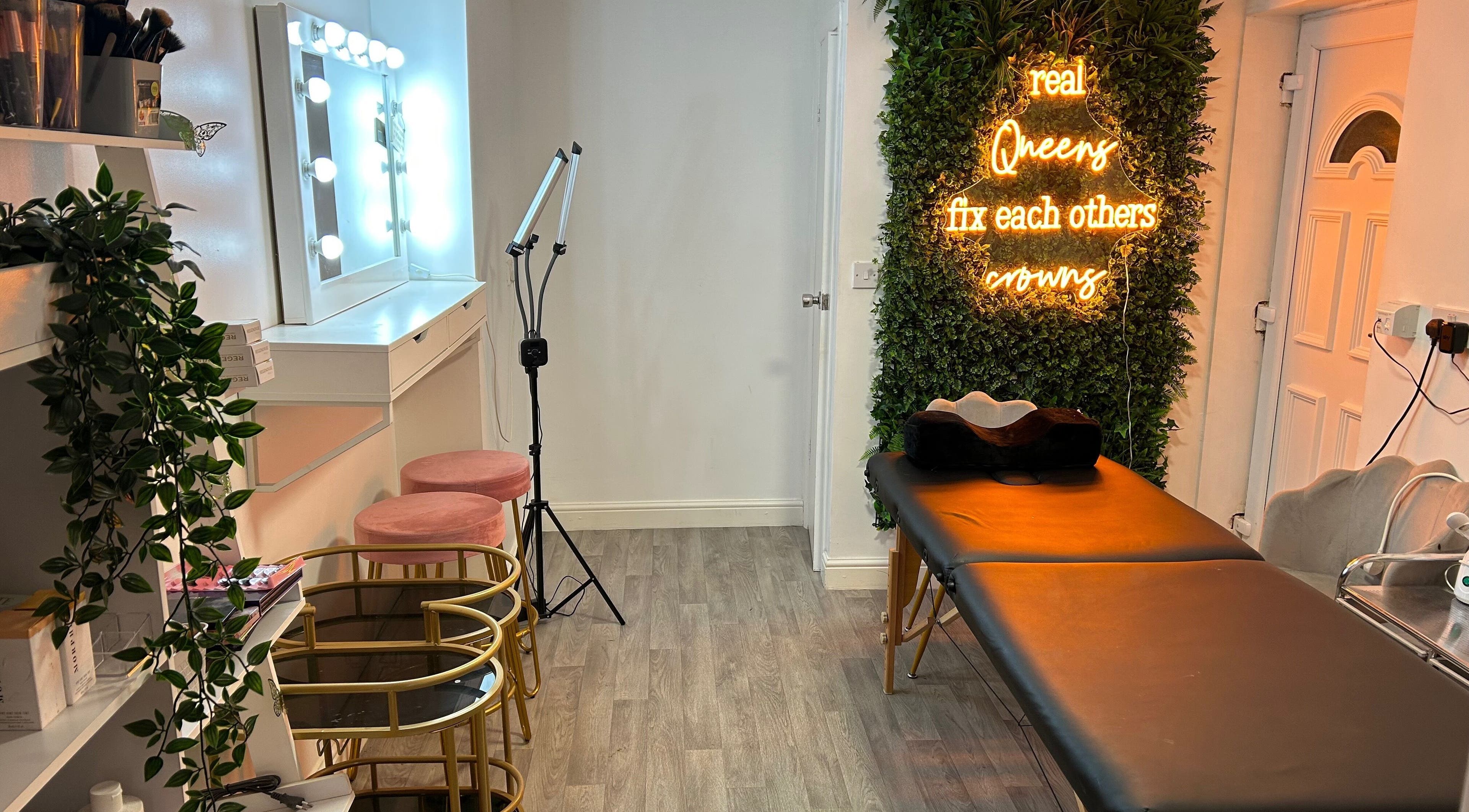 Luxurious beauty room at The SAS Sanctuary and Academy in Stockport, England, GB with wall art and vanity mirror.