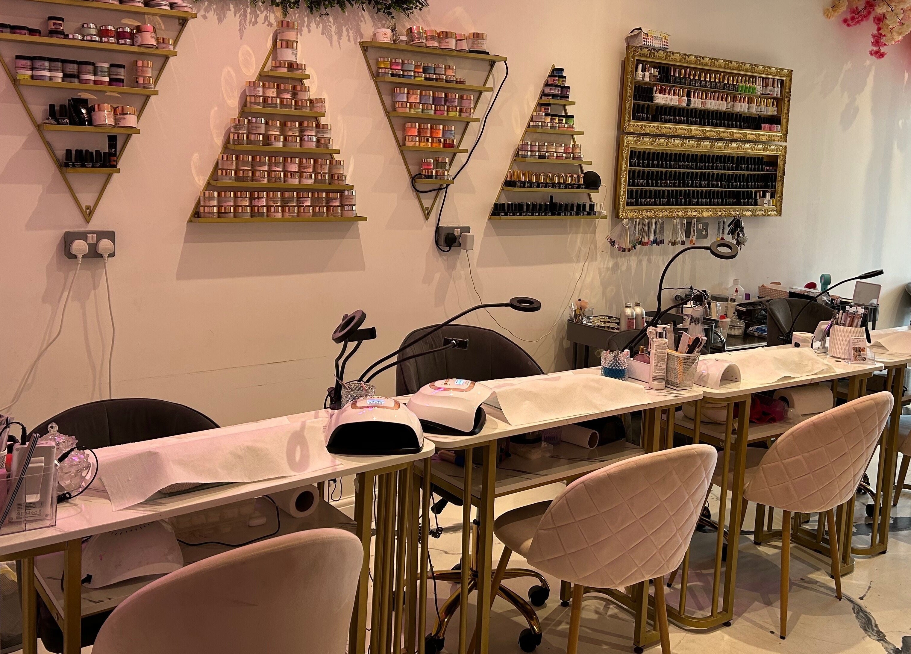 Nail service area at The SAS Sanctuary and Academy, Stockport, England with decor and manicure stations.