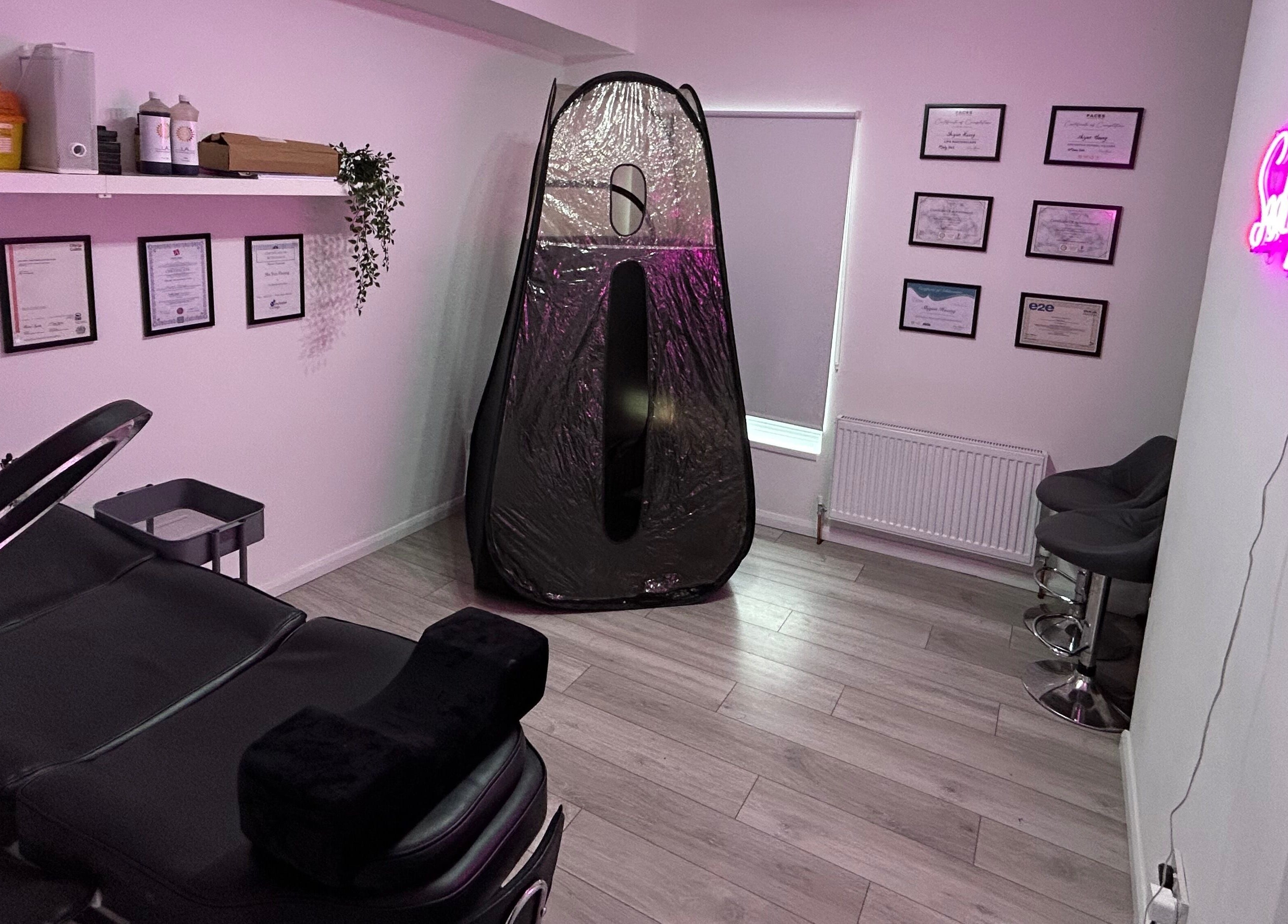 Cosy treatment room at The SAS Sanctuary and Academy, Stockport, England, GB, featuring relaxing decor and equipment.