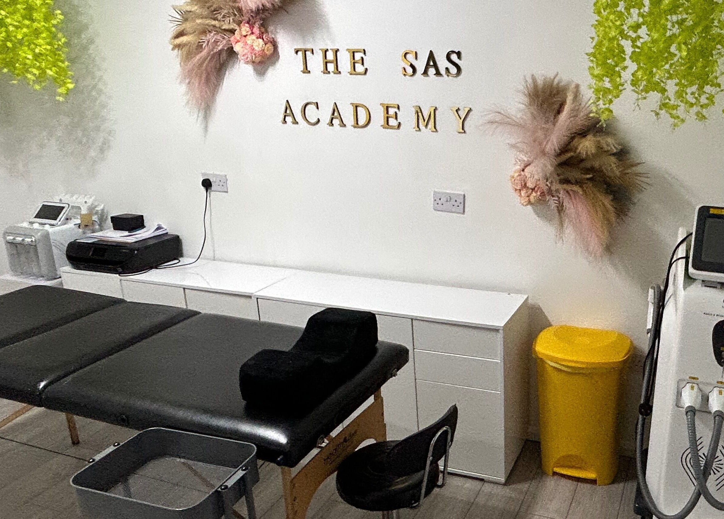 Modern treatment room at The SAS Sanctuary and Academy, Stockport, England, GB, with sleek decor and equipment.