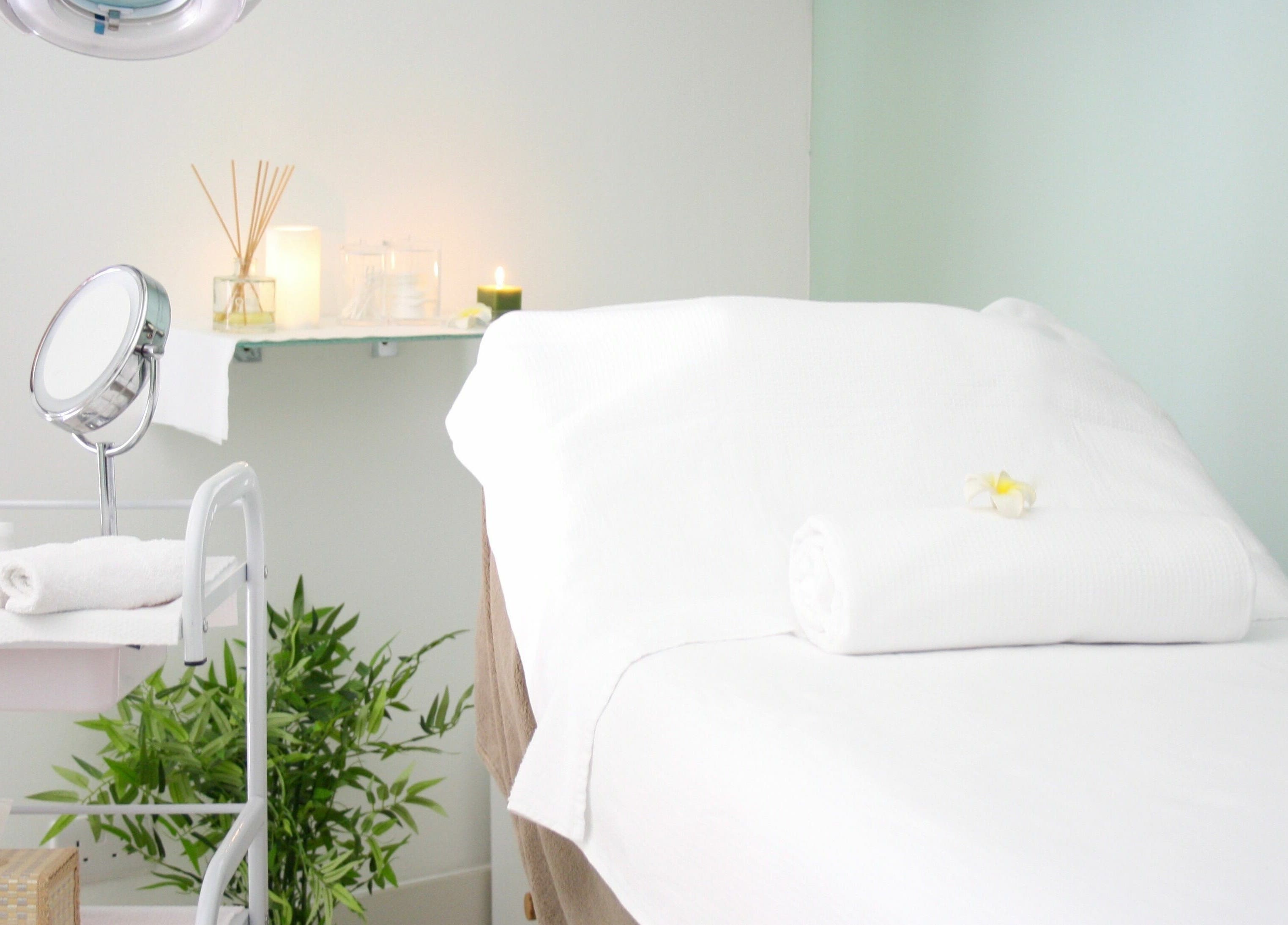 Relaxing treatment room at Beauty Addict in Abuja, Federal Capital Territory, NG with fresh linens and calming decor.