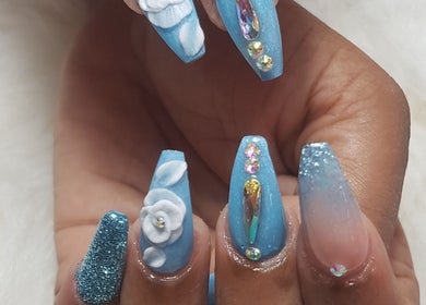 Stylish blue nail art with 3D flowers at Teaser's Nail Care, Bridgetown, Saint James, BB.