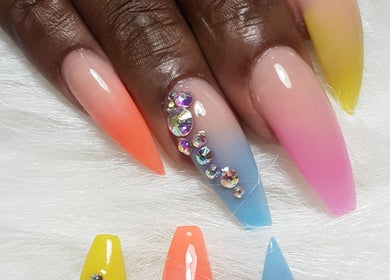 Vibrant nail art with gems at Teaser's Nail Care, Bridgetown, Saint James, BB.